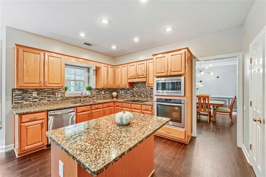 4 bedroom, 3 bathroom, 3,063 sq ft single family residence for sale at 1120 Grace Hadaway Lane, Lawrenceville, GA 30043 — photo 7