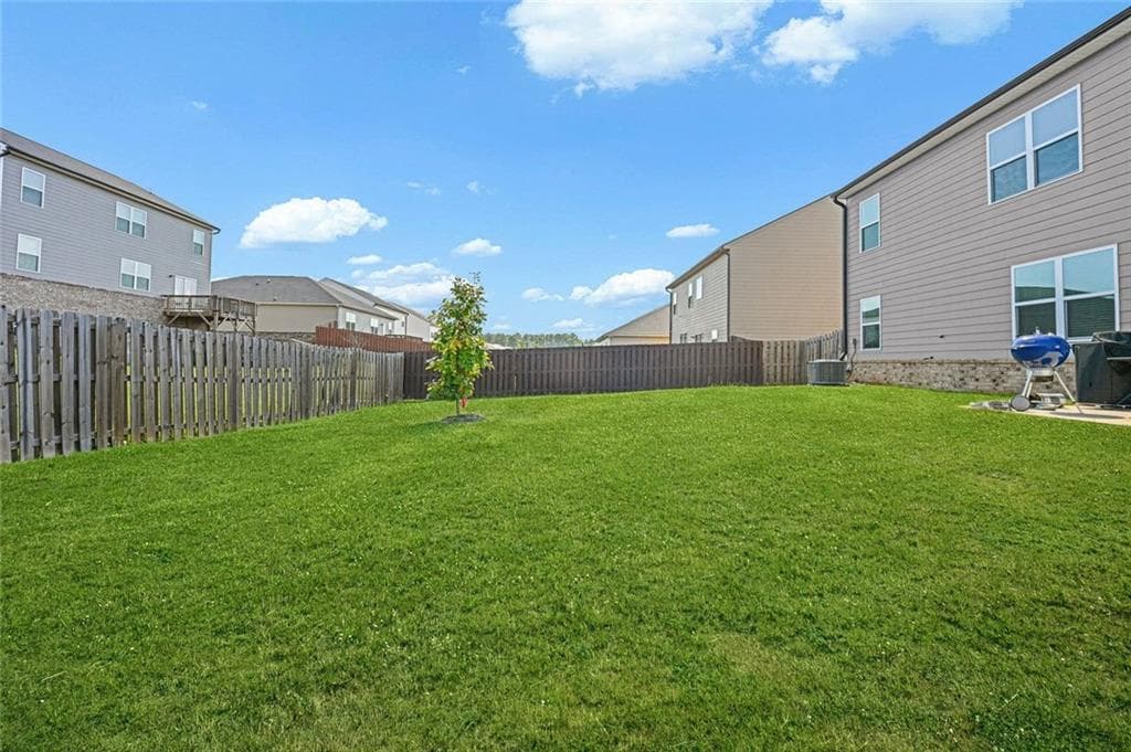5 bedroom, 3 bathroom, 3,210 sq ft single family residence for sale at 394 Faulkner Street, Stockbridge, GA 30281 — photo 6