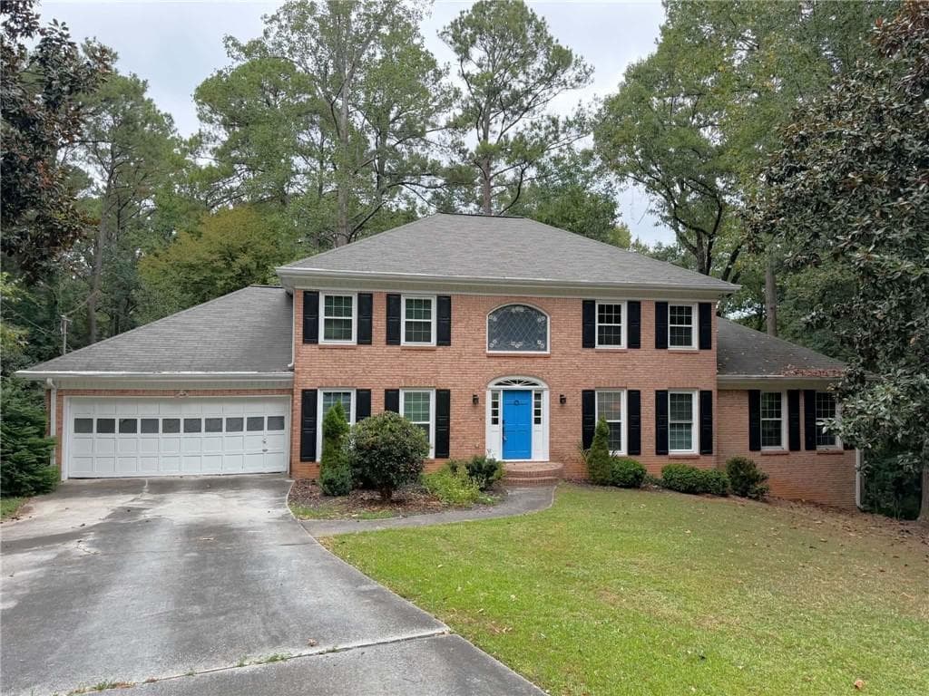 4 bedroom, 3 bathroom, 5,327 sq ft home for sale at 2562 River Knoll Drive, Lilburn, GA