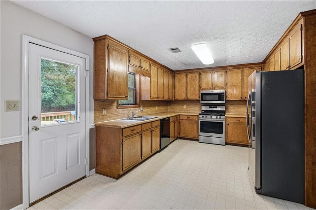 4 bedroom, 4 bathroom, 2,365 sq ft single family residence for sale at 1151 Rocky Rd Road, Lawrenceville, GA 30044 — photo 8