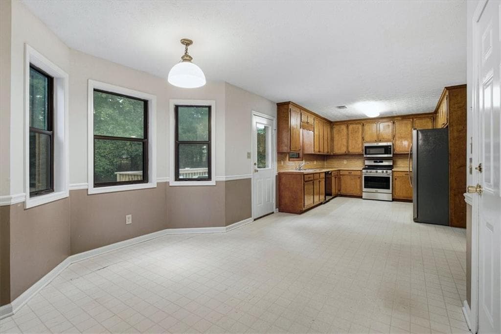 4 bedroom, 4 bathroom, 2,365 sq ft single family residence for sale at 1151 Rocky Rd Road, Lawrenceville, GA 30044 — photo 10