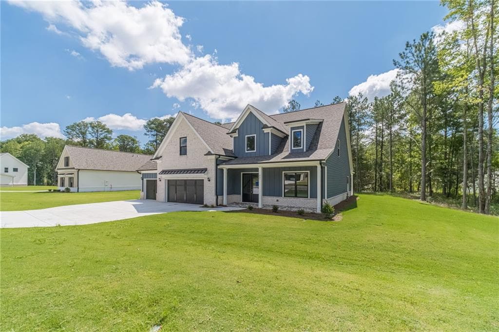 4 bedroom, 4 bathroom, 3,451 sq ft single family residence for sale at 887 Bessie Court, Loganville, GA 30052 — photo 2