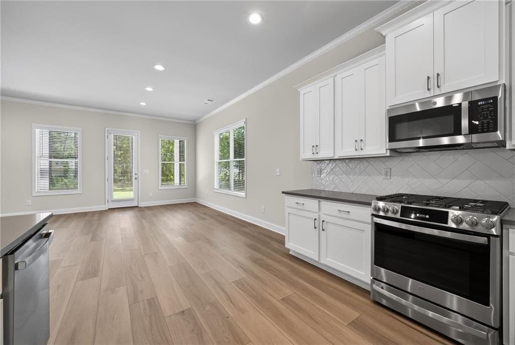 4 bedroom, 4 bathroom, 3,451 sq ft single family residence for sale at 887 Bessie Court, Loganville, GA 30052 — photo 5