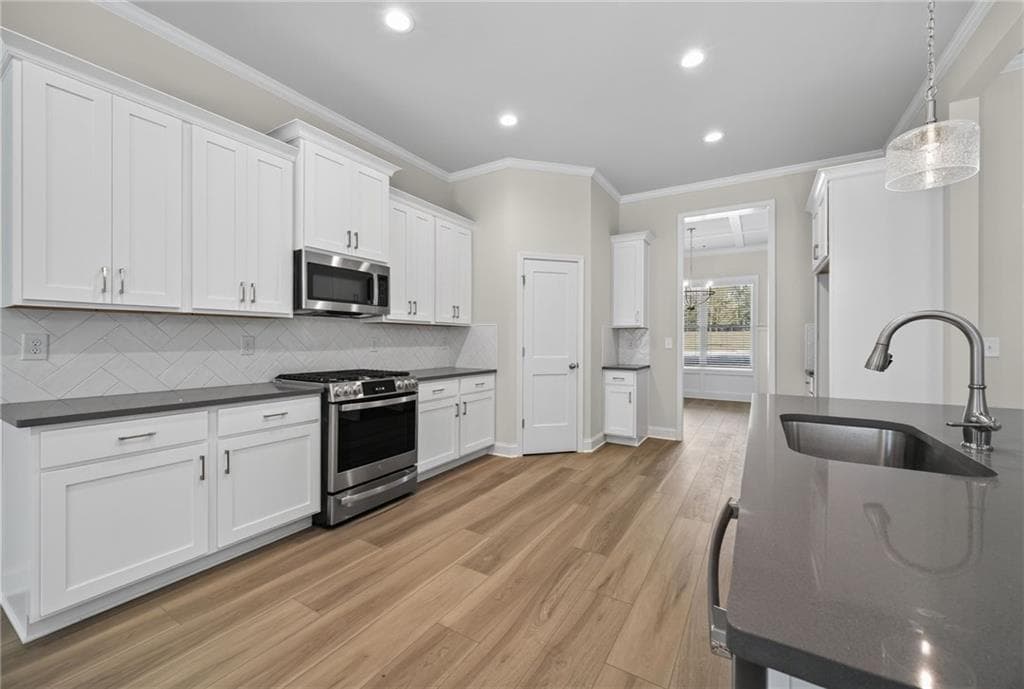 4 bedroom, 4 bathroom, 3,451 sq ft single family residence for sale at 887 Bessie Court, Loganville, GA 30052 — photo 7