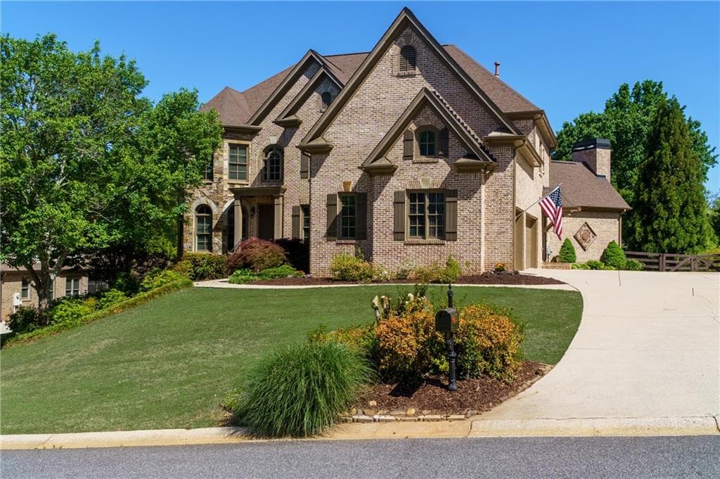 6 bedroom, 5 bathroom, 6,391 sq ft home for sale at 5940 Boulder Bluff Drive, Cumming, GA