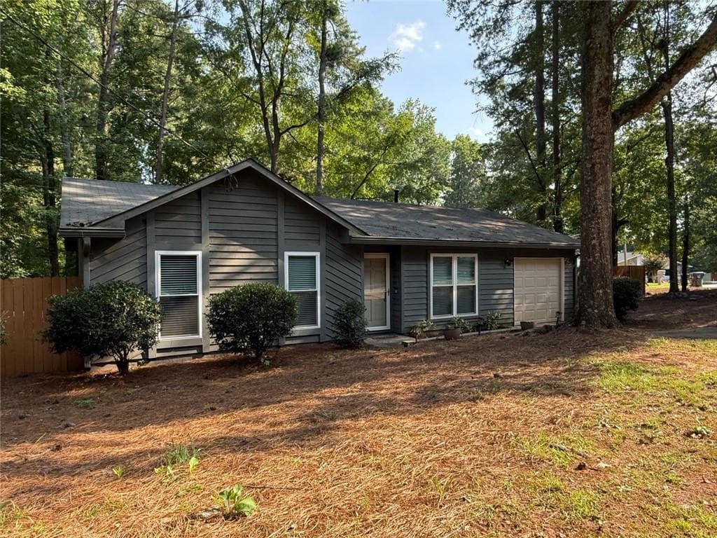 3 bedroom, 2 bathroom, 1,436 sq ft single family residence for sale at 1420 Indian Way, Lilburn, GA 30047 — photo 2