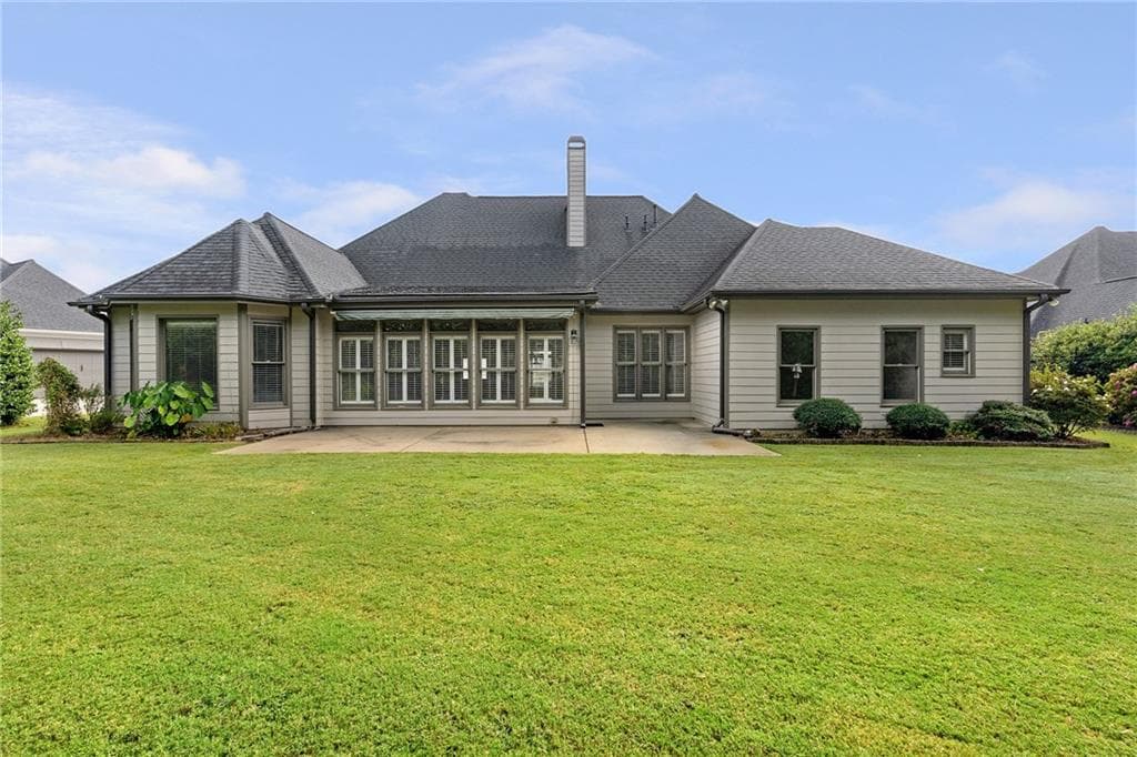 4 bedroom, 3 bathroom, 3,355 sq ft single family residence for sale at 7095 Grassmoor Grange Way, Cumming, GA 30040 — photo 7