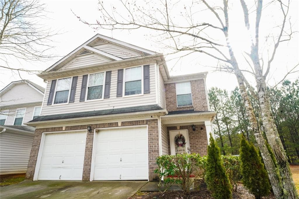 4 bedroom, 3 bathroom, 2,238 sq ft single family residence for sale at 1942 Eshelman Court, Atlanta, GA 30349 — photo 2