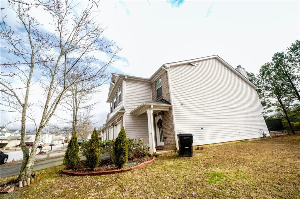 4 bedroom, 3 bathroom, 2,238 sq ft single family residence for sale at 1942 Eshelman Court, Atlanta, GA 30349 — photo 6