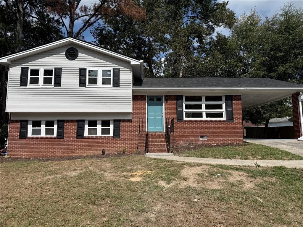 4 bedroom, 3 bathroom, 1,946 sq ft single family residence for sale at 3229 Vanderbilt Lane, Atlanta, GA 30318 — photo 2