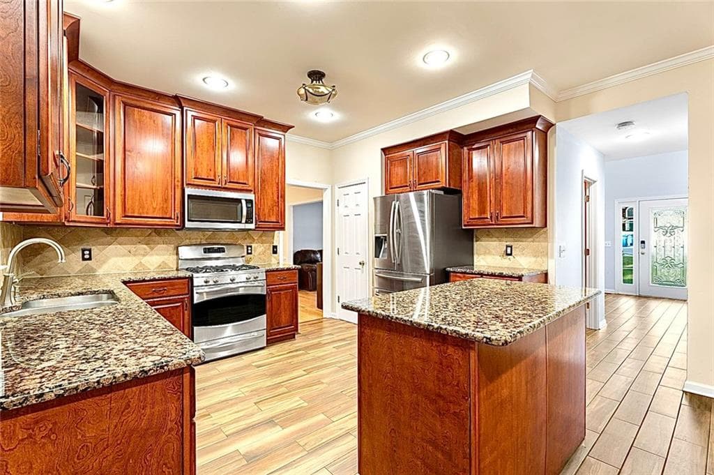 4 bedroom, 3 bathroom, 3,824 sq ft single family residence for sale at 3378 Willbrooke Court, Duluth, GA 30096 — photo 2