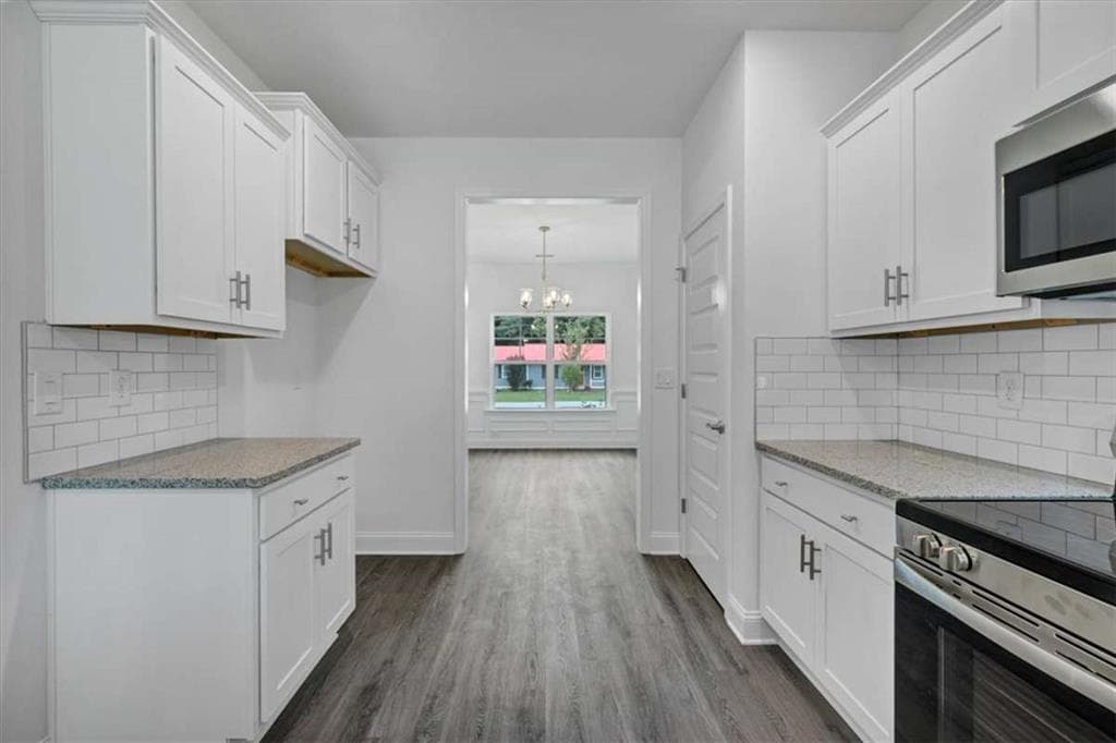 4 bedroom, 2 bathroom, 2,030 sq ft single family residence for sale at 317 Angela Avenue, Bowdon, GA 30108 — photo 6