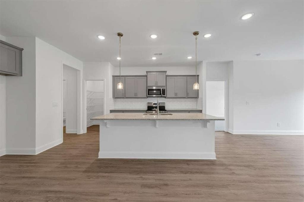 4 bedroom, 3 bathroom, 2,328 sq ft single family residence for sale at 313 Angela Avenue, Bowdon, GA 30108 — photo 3