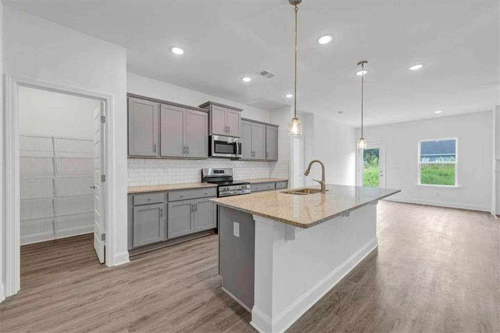 4 bedroom, 3 bathroom, 2,328 sq ft single family residence for sale at 313 Angela Avenue, Bowdon, GA 30108 — photo 5