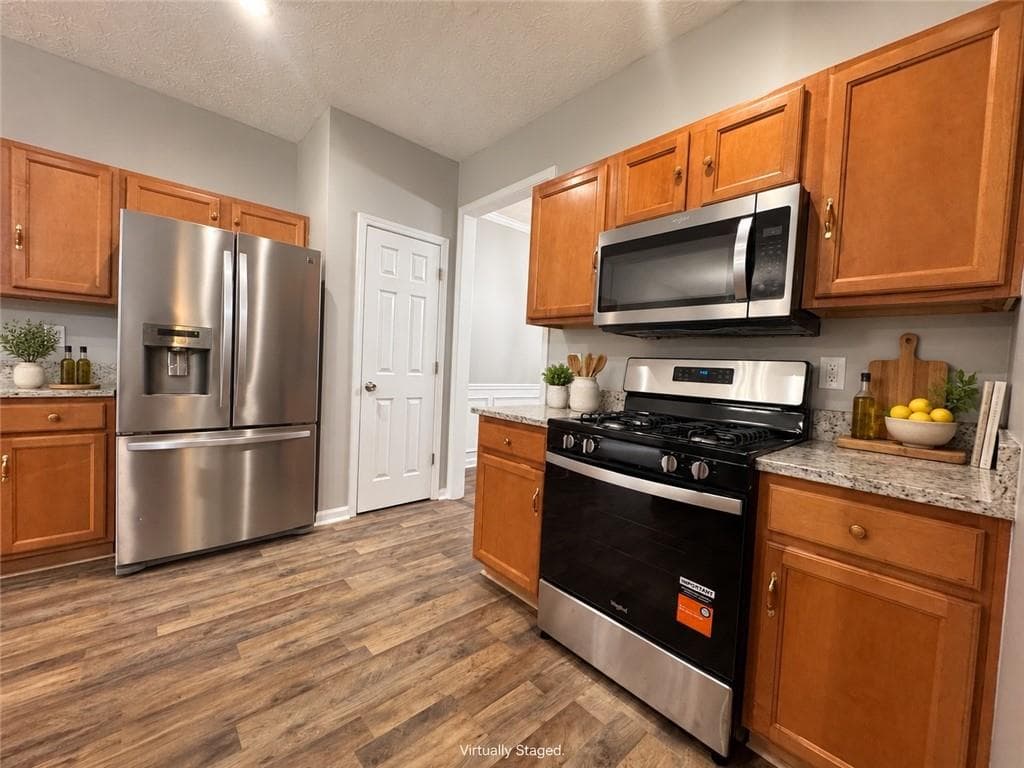 5 bedroom, 4 bathroom, 3,700 sq ft single family residence for sale at 4461 Plantation Mill Trail, Buford, GA 30519 — photo 9