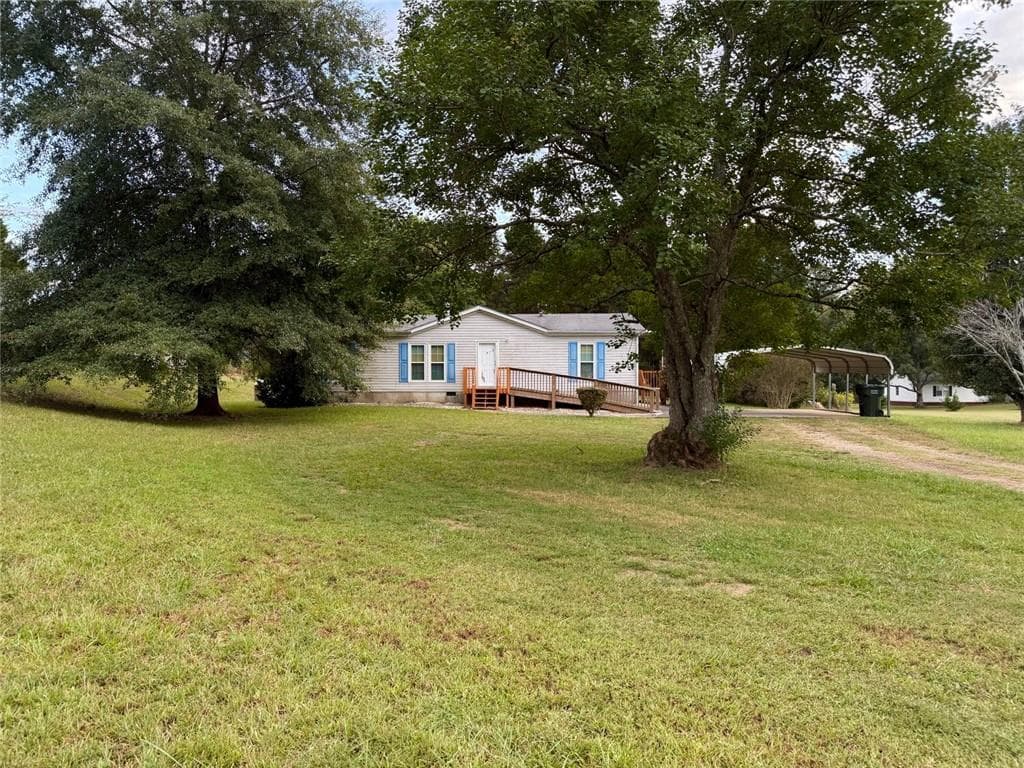3 bedroom, 2 bathroom, 1,344 sq ft single family residence for sale at 3015 Tommy Dillard Road, Monroe, GA 30656 — photo 2