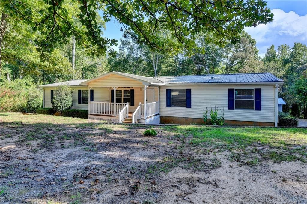 4 bedroom, 2 bathroom, 2,016 sq ft single family residence for sale at 5500 Hemlock Court, Lula, GA 30554