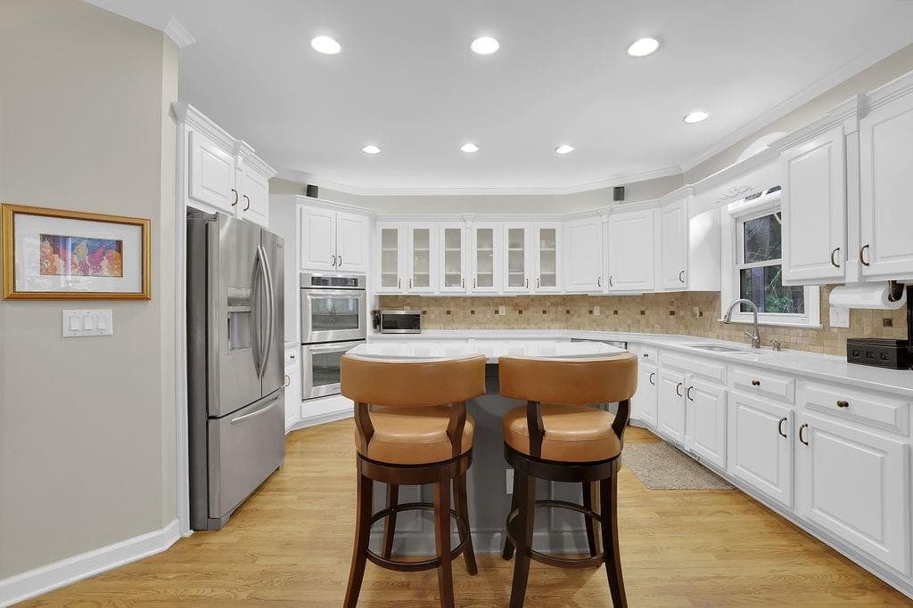 6 bedroom, 5 bathroom, 5,588 sq ft single family residence for sale at 4294 Balmoral Glen Drive, Norcross, GA 30092 — photo 4