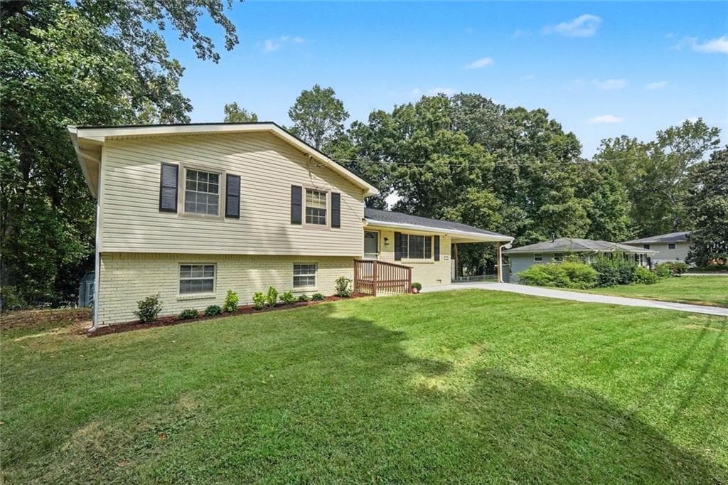 4 bedroom, 3 bathroom, 1,851 sq ft single family residence for sale at 1229 Deleon Court, Clarkston, GA 30021 — photo 4