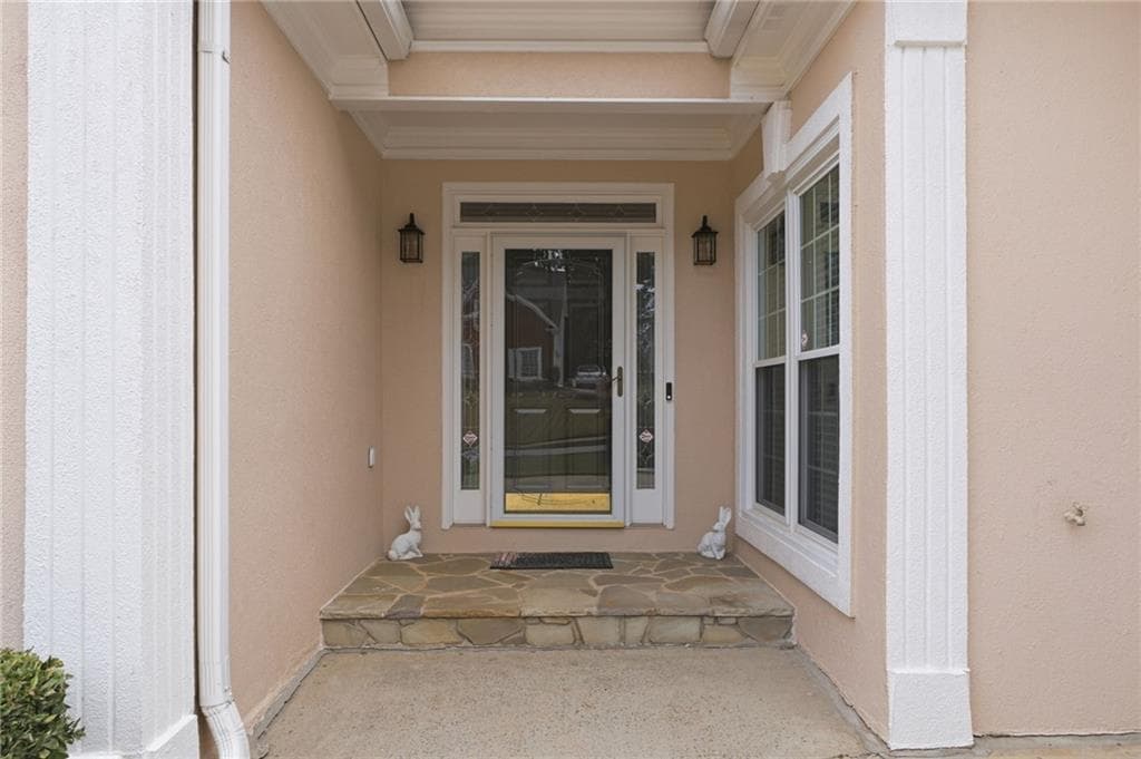 4 bedroom, 4 bathroom, 2,716 sq ft single family residence for sale at 2371 Wood Creek Court, Dacula, GA 30019 — photo 2
