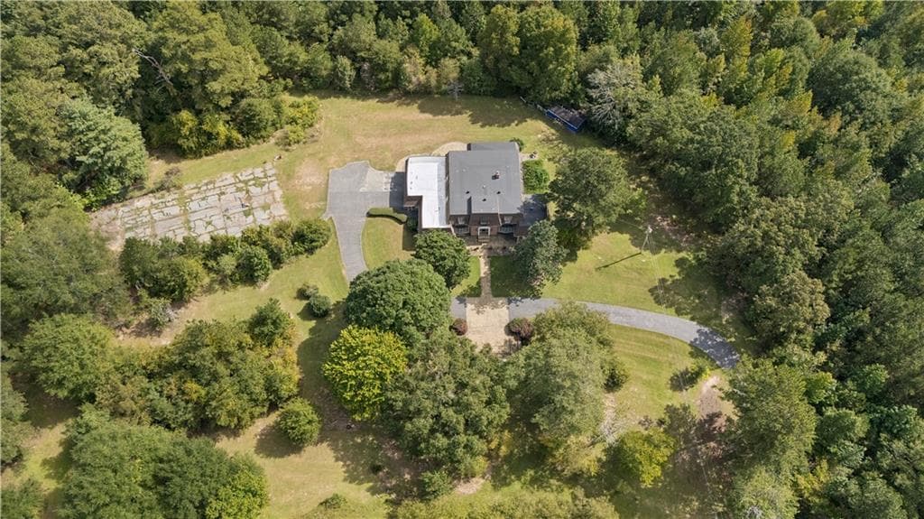 6 bedroom, 5 bathroom, 5,437 sq ft single family residence for sale at 1048 W Macedonia Church Road, Oxford, GA 30054