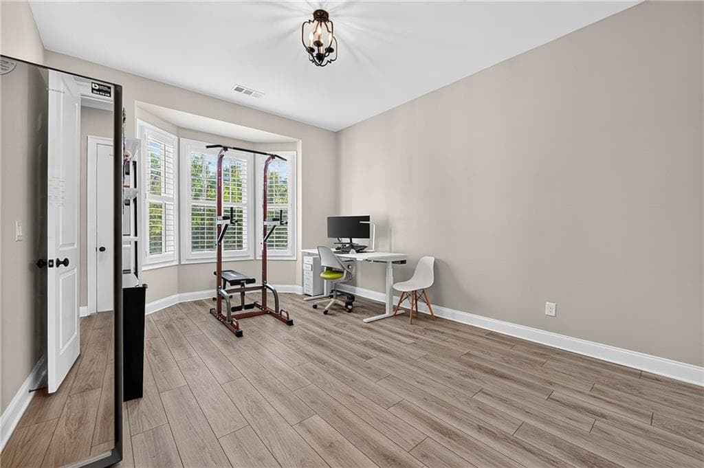 7 bedroom, 5 bathroom, 4,610 sq ft single family residence for sale at 6585 Creekview Circle, Johns Creek, GA 30097 — photo 7
