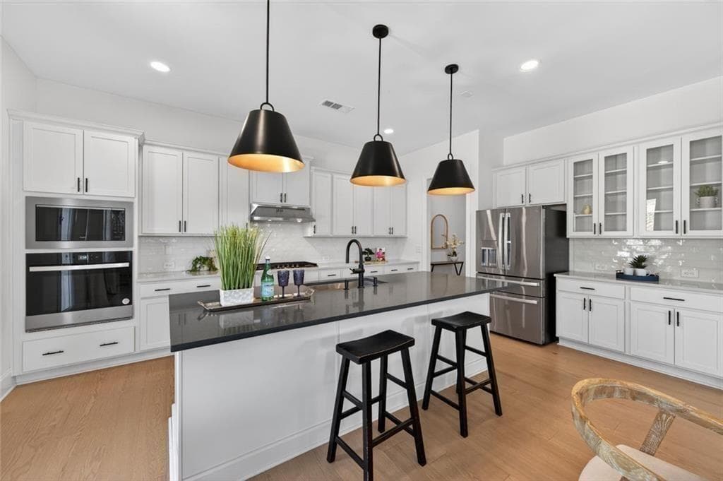 5 bedroom, 4 bathroom, 3,415 sq ft single family residence for sale at 5014 Baywood Lane, Woodstock, GA 30188 — photo 3