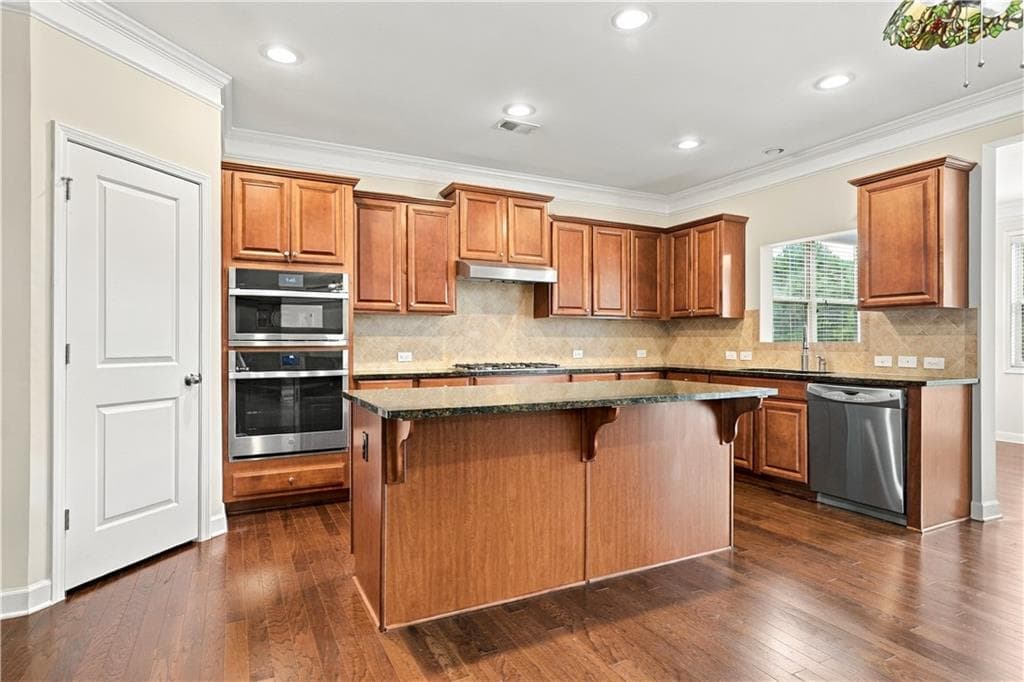 5 bedroom, 4 bathroom, 4,422 sq ft single family residence for sale at 4335 Sanibel Cove, Cumming, GA 30040 — photo 10