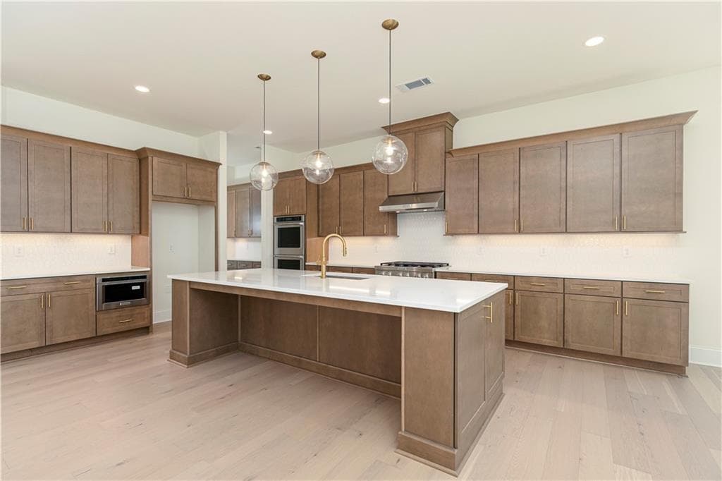 5 bedroom, 6 bathroom, 3,341 sq ft single family residence for sale at 2405 Bleckley Place, Cumming, GA 30041 — photo 6