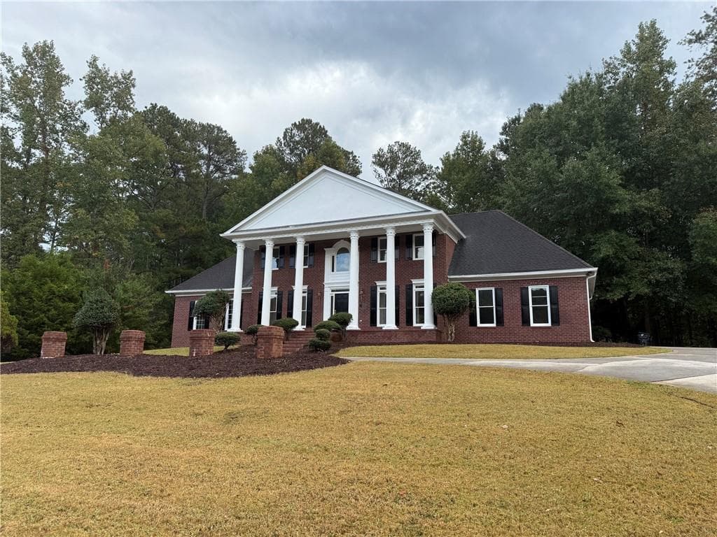 7 bedroom, 4 bathroom, 3,480 sq ft single family residence for sale at 110 Emerald Lake Drive, Fayetteville, GA 30215 — photo 2