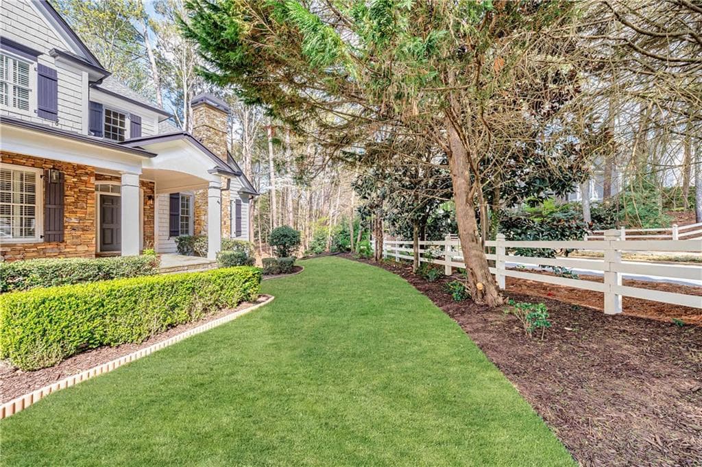 4 bedroom, 5 bathroom, 4,641 sq ft single family residence for sale at 2090 Lake Windward Drive, Alpharetta, GA 30005 — photo 2