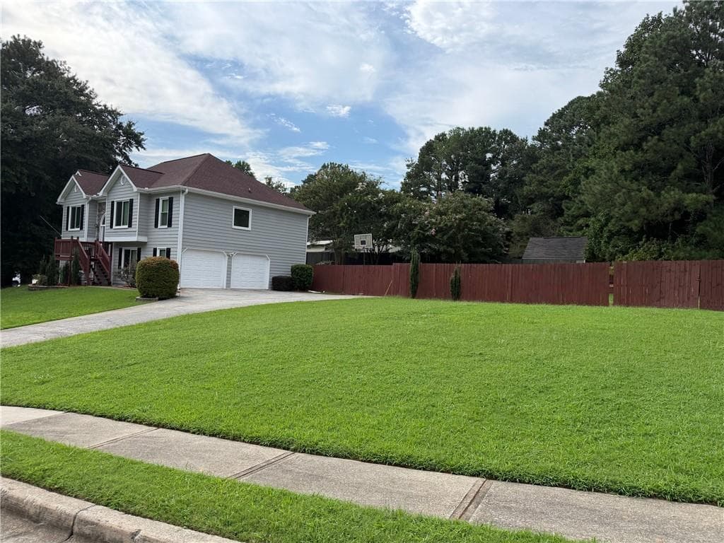 4 bedroom, 3 bathroom, 2,402 sq ft single family residence for rent at 1755 Katrina Jo Ann Circle, Dacula, GA 30019 for $2,500 a month — photo 2