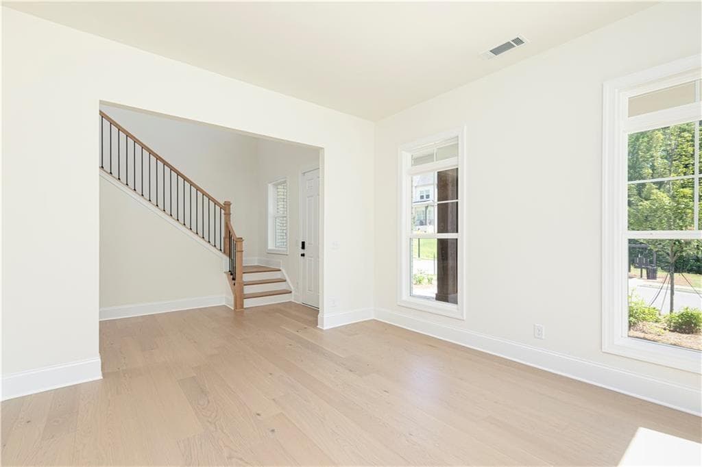 5 bedroom, 6 bathroom, 3,341 sq ft single family residence for sale at 2405 Bleckley Place, Cumming, GA 30041 — photo 4
