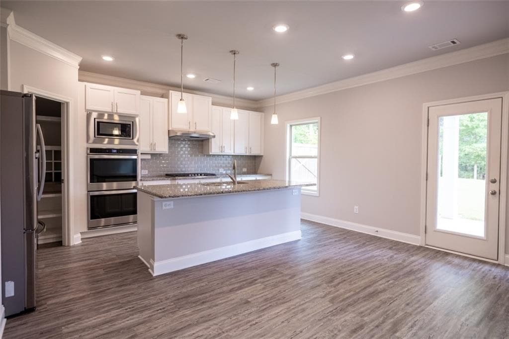 5 bedroom, 4 bathroom, 3,385 sq ft single family residence for sale at 352 Newshaw Drive, Lawrenceville, GA 30046 — photo 6