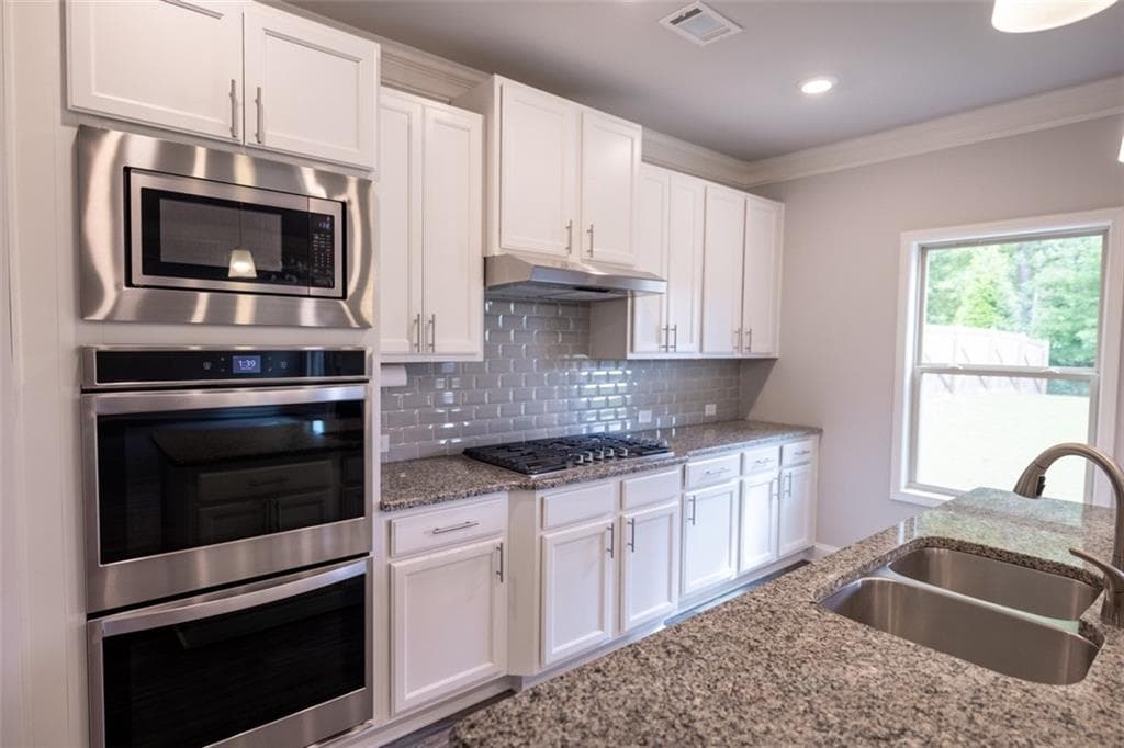 5 bedroom, 4 bathroom, 3,385 sq ft single family residence for sale at 352 Newshaw Drive, Lawrenceville, GA 30046 — photo 7