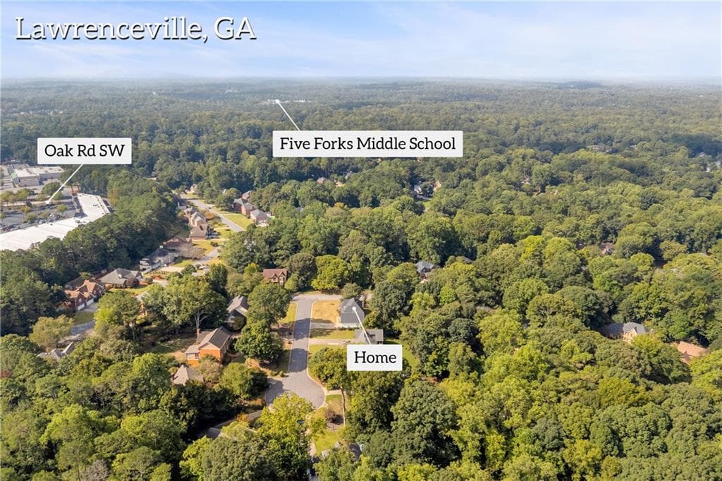5 bedroom, 3 bathroom, 3,078 sq ft single family residence for sale at 667 Michelle Court, Lawrenceville, GA 30044 — photo 3