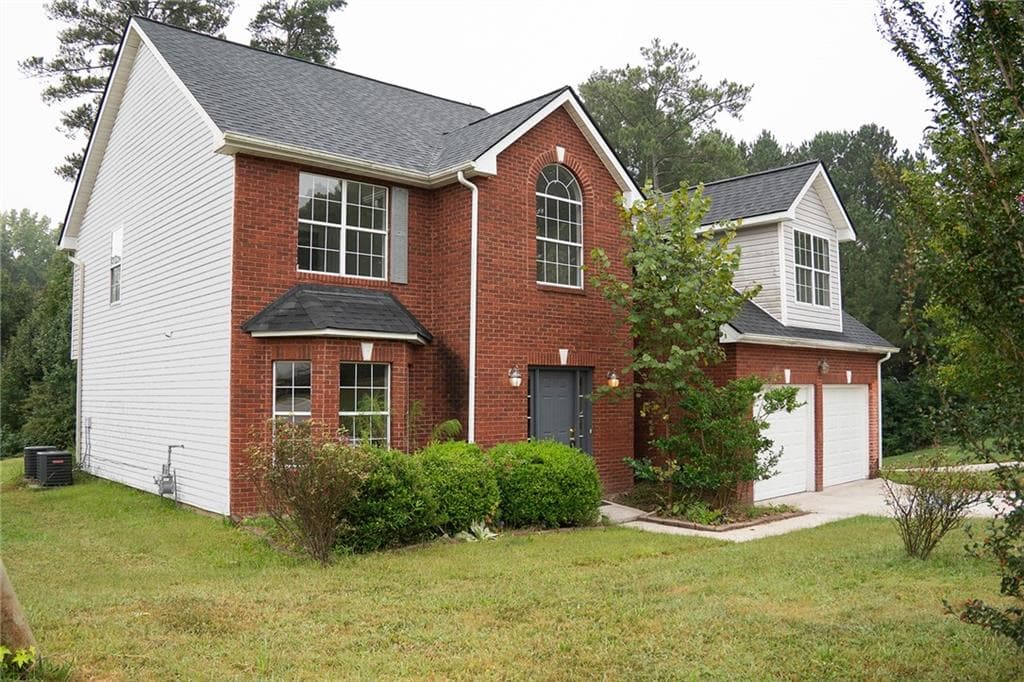 4 bedroom, 3 bathroom, 2,498 sq ft single family residence for sale at 7009 Brecken Trace, Lithonia, GA 30058 — photo 2