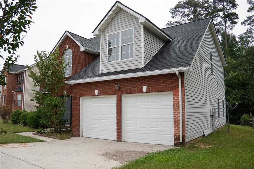 4 bedroom, 3 bathroom, 2,498 sq ft single family residence for sale at 7009 Brecken Trace, Lithonia, GA 30058 — photo 3