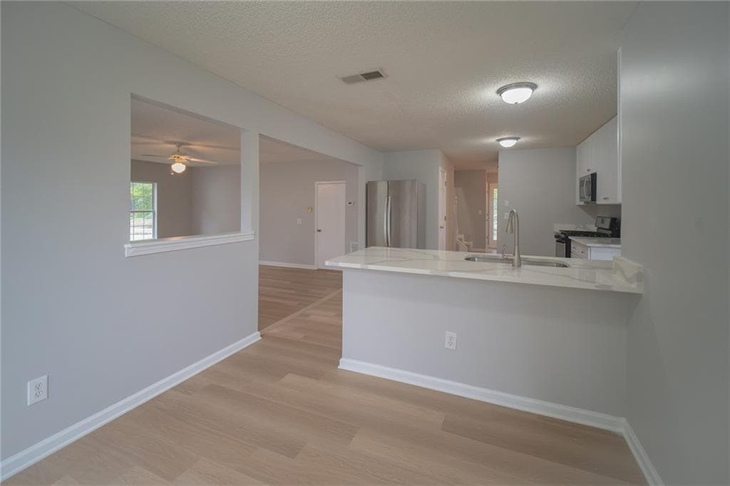4 bedroom, 3 bathroom, 2,498 sq ft single family residence for sale at 7009 Brecken Trace, Lithonia, GA 30058 — photo 8