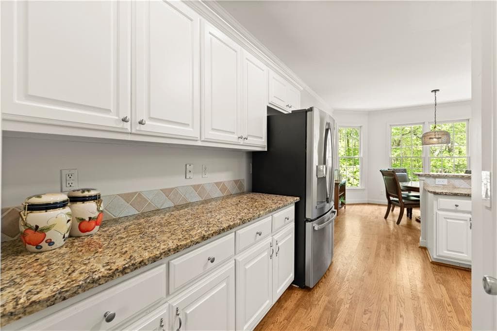 5 bedroom, 5 bathroom, 4,120 sq ft single family residence for sale at 4425 Woodside Court, Cumming, GA 30041 — photo 6