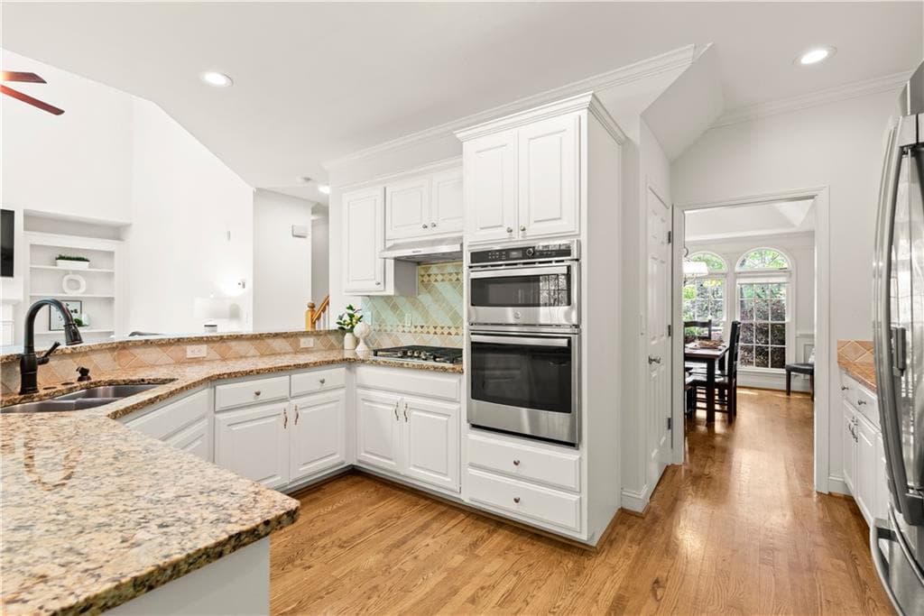 5 bedroom, 5 bathroom, 4,120 sq ft single family residence for sale at 4425 Woodside Court, Cumming, GA 30041 — photo 8