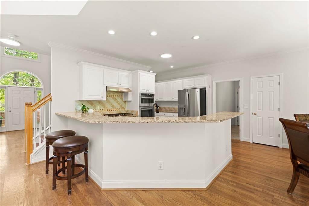 5 bedroom, 5 bathroom, 4,120 sq ft single family residence for sale at 4425 Woodside Court, Cumming, GA 30041 — photo 10