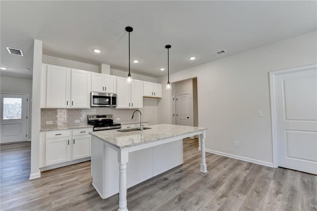 4 bedroom, 3 bathroom, 2,511 sq ft single family residence for sale at 696 Rodeo Drive, Auburn, GA 30011 — photo 10