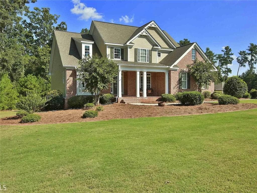 4 bedroom, 5 bathroom, 3,996 sq ft single family residence for sale at 215 River Dance Way, Tyrone, GA 30290