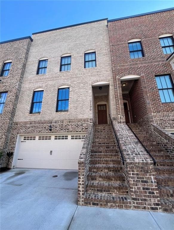 4 bedroom, 4 bathroom, 2,697 sq ft townhouse for sale at 2170 Rail Yard Ave, Grayson, GA 30017 — photo 1 of 15