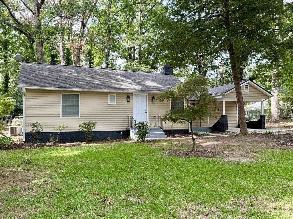 4 bedroom, 2 bathroom, 1,614 sq ft single family residence for sale at 1268 Woodland Road, Conyers, GA 30012