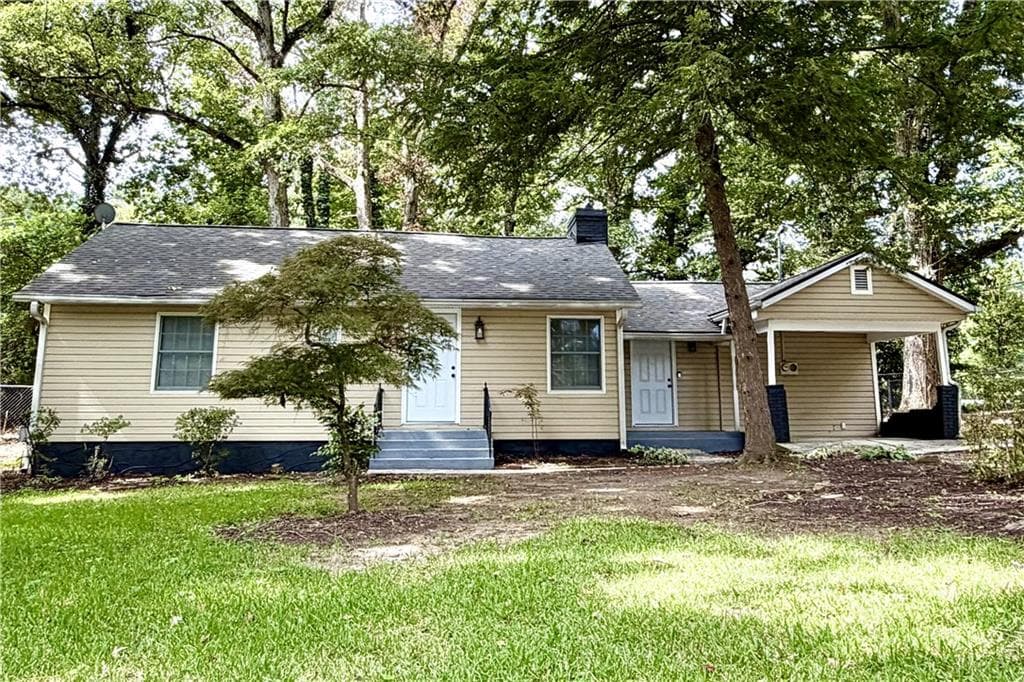 4 bedroom, 2 bathroom, 1,614 sq ft single family residence for sale at 1268 Woodland Road, Conyers, GA 30012 — photo 2