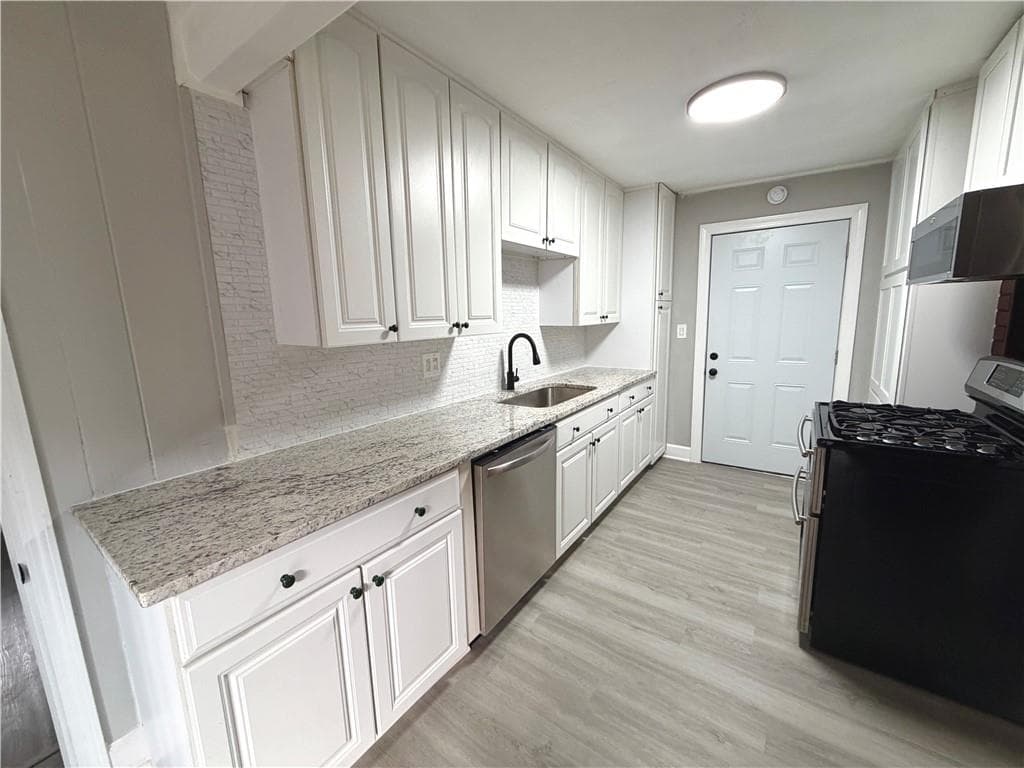 4 bedroom, 2 bathroom, 1,614 sq ft single family residence for sale at 1268 Woodland Road, Conyers, GA 30012 — photo 8