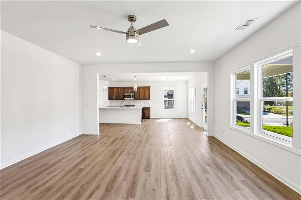 5 bedroom, 4 bathroom, 2,843 sq ft single family residence for sale at 5464 Hargrove Way, Flowery Branch, GA 30542 — photo 5