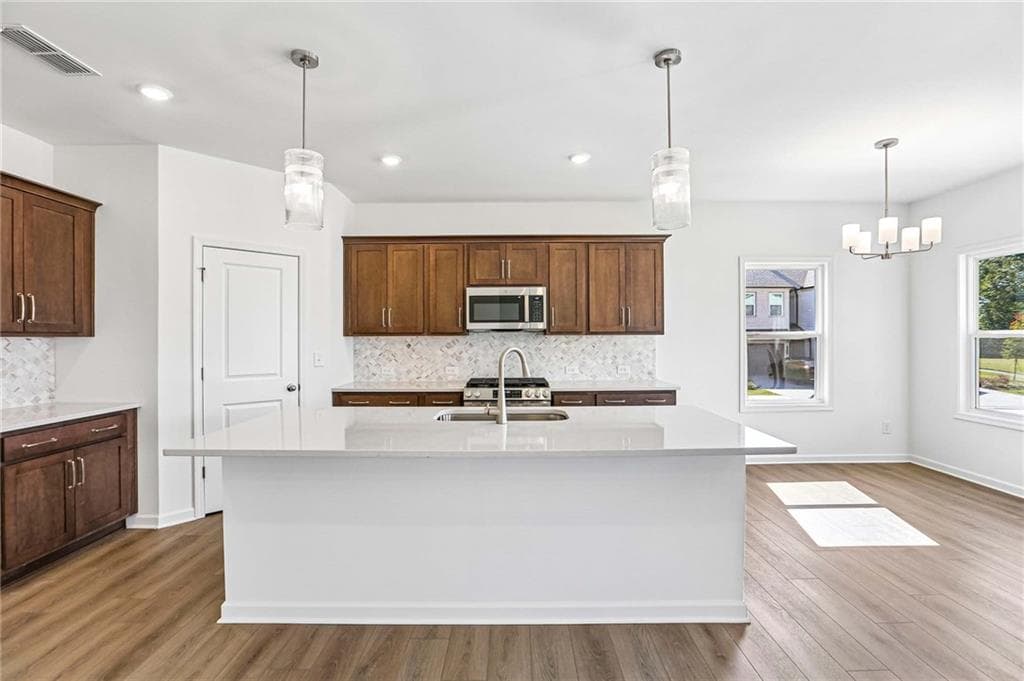 5 bedroom, 4 bathroom, 2,843 sq ft single family residence for sale at 5464 Hargrove Way, Flowery Branch, GA 30542 — photo 7